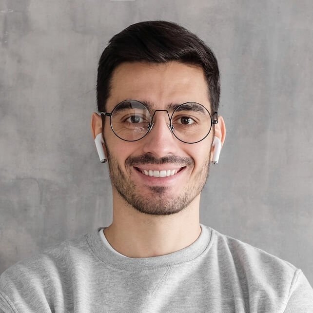 young handsome man standing with crossed arms td2s3e7.jpg